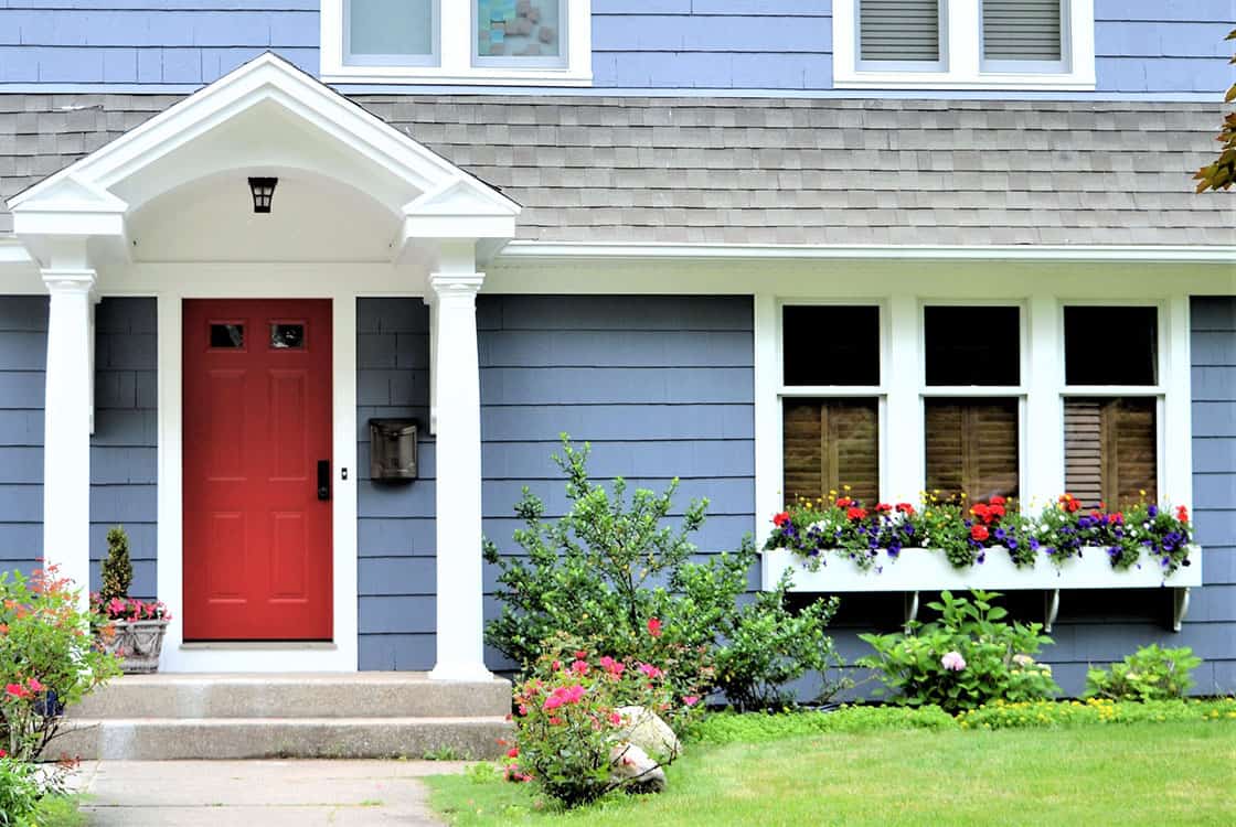 Blue house with red door