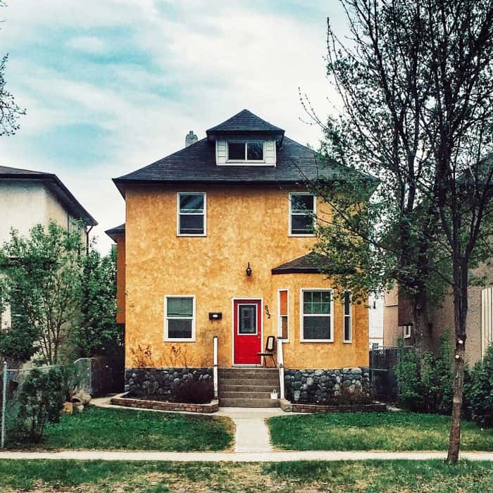 Yellow house with red door